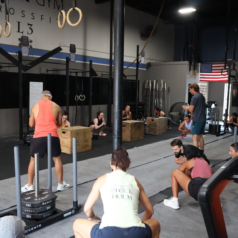 Barbell class training on the floor