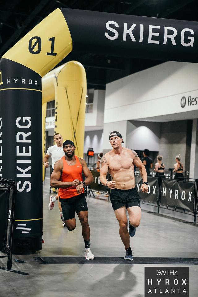Clayton Marshall running out of the SkiErg station at HYROX Atlanta